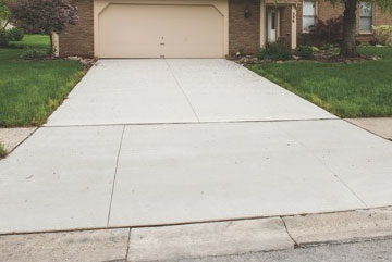 terrasse synfy aménageur descente de garage en beton brut
